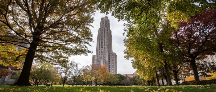 Cathedral of Learning framed by trees